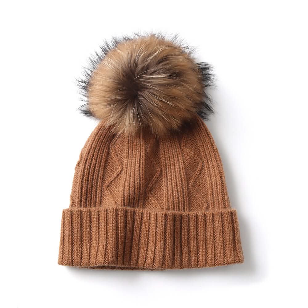 Women’s luxury cashmere beanie with ribbed knit texture, soft warm designer winter hat.
