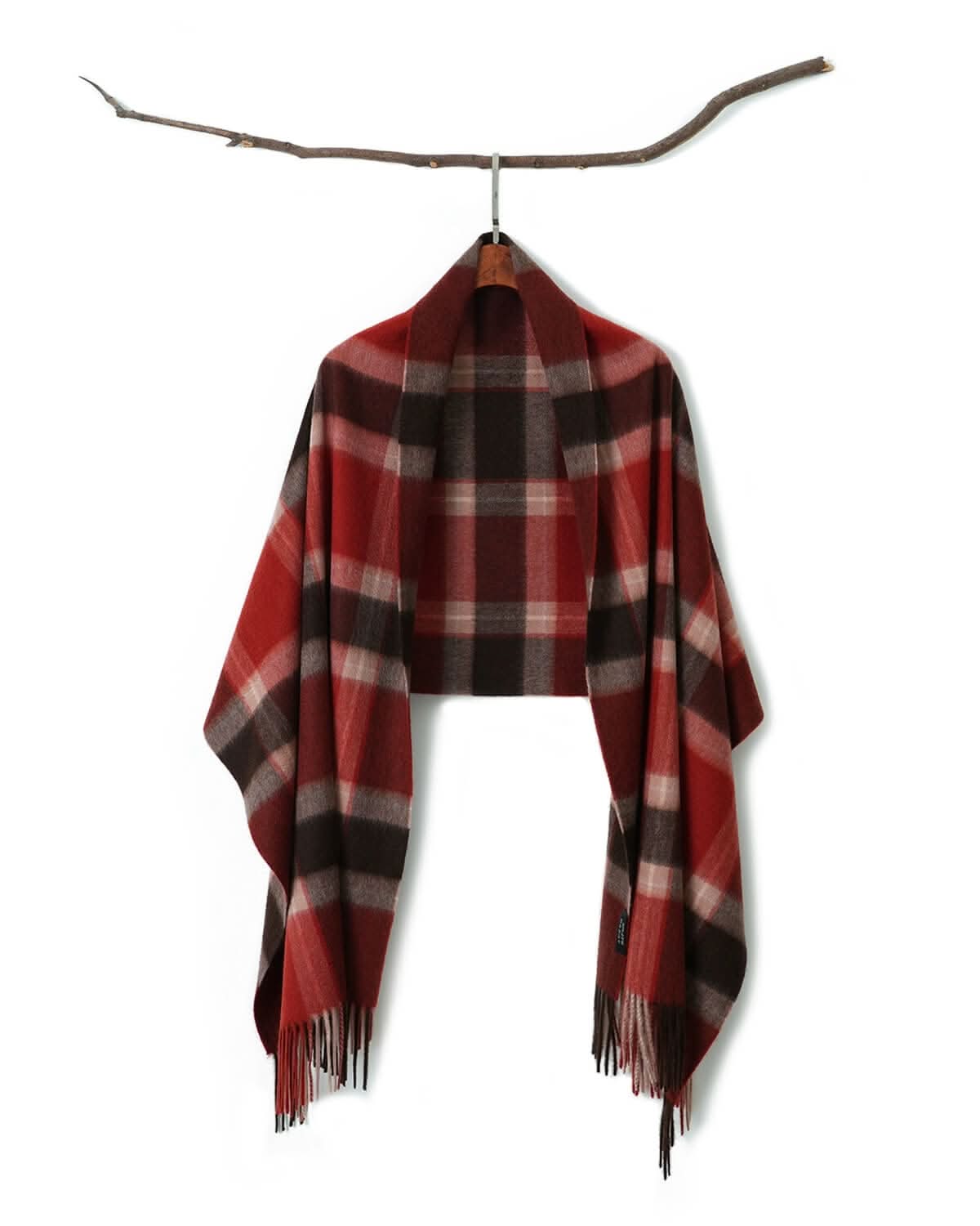 oversized red plaid cashmere wrap as a shawl in outdoor setting